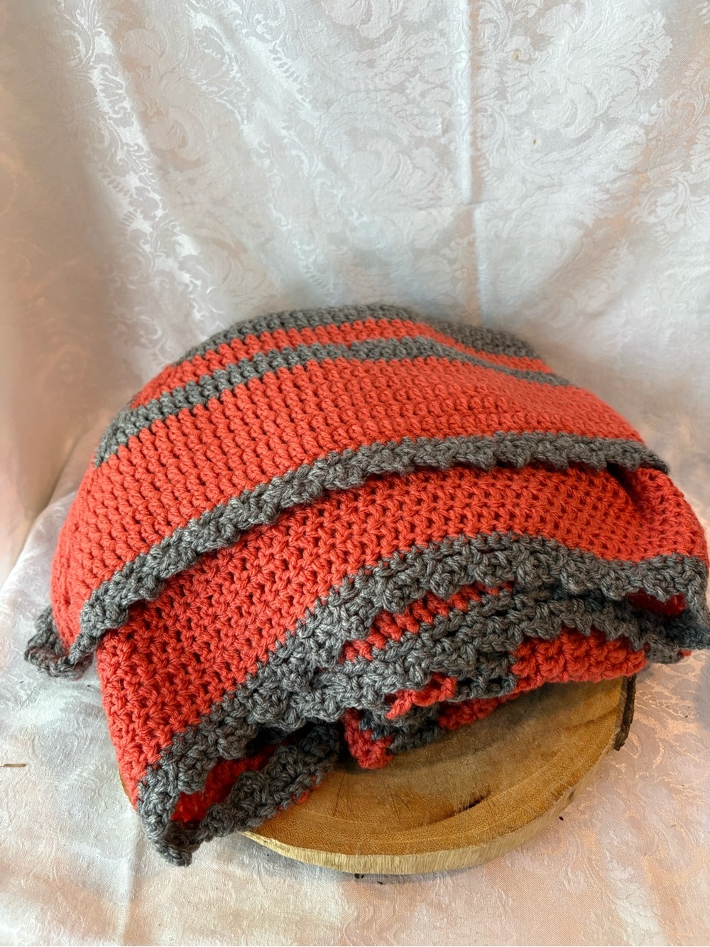 grey red/orange crochet blanket